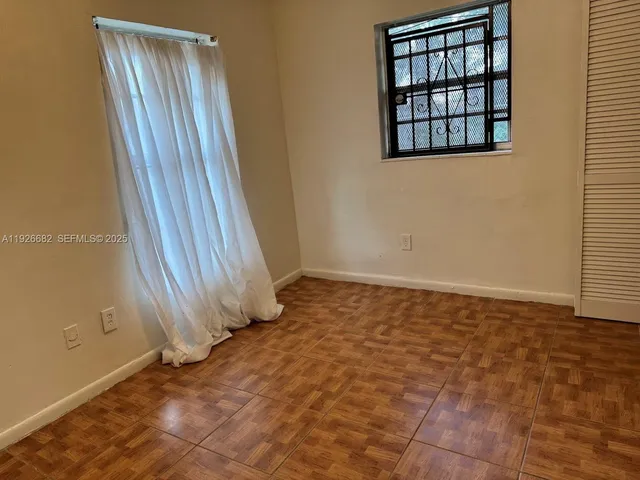 an empty room with a window