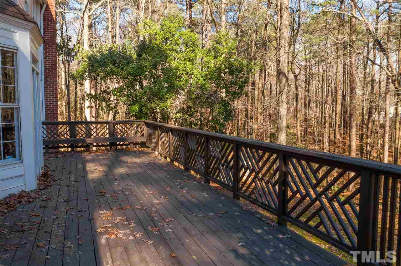 8528 Bournemouth Drive Raleigh, NC 27615 - Photo 14 of 30 Rear patio overlooking the wooded lot with unbelievable privacy and serenity.