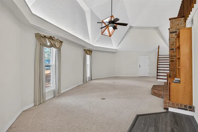 a view of a livingroom with a staircase