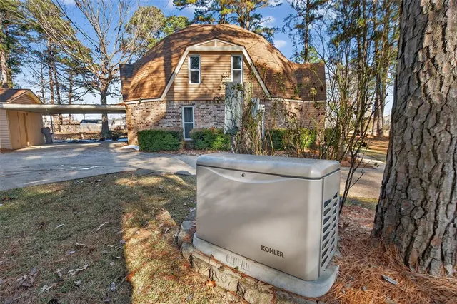 a view of yard along with trees
