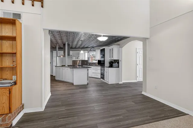 a view of kitchen with wooden floor