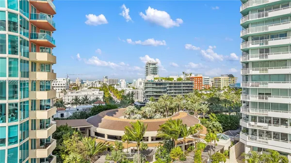 a bathroom with a sink tub and a mirror