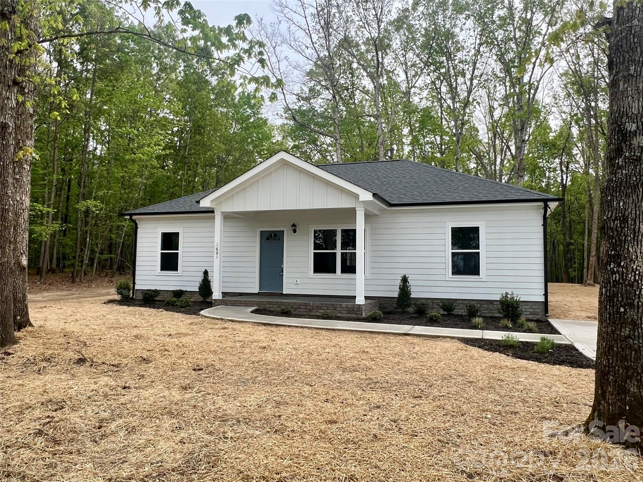 1601 North Sutherland Avenue Monroe, NC 28110 - Photo 1 of 1 a house view with a outdoor space
