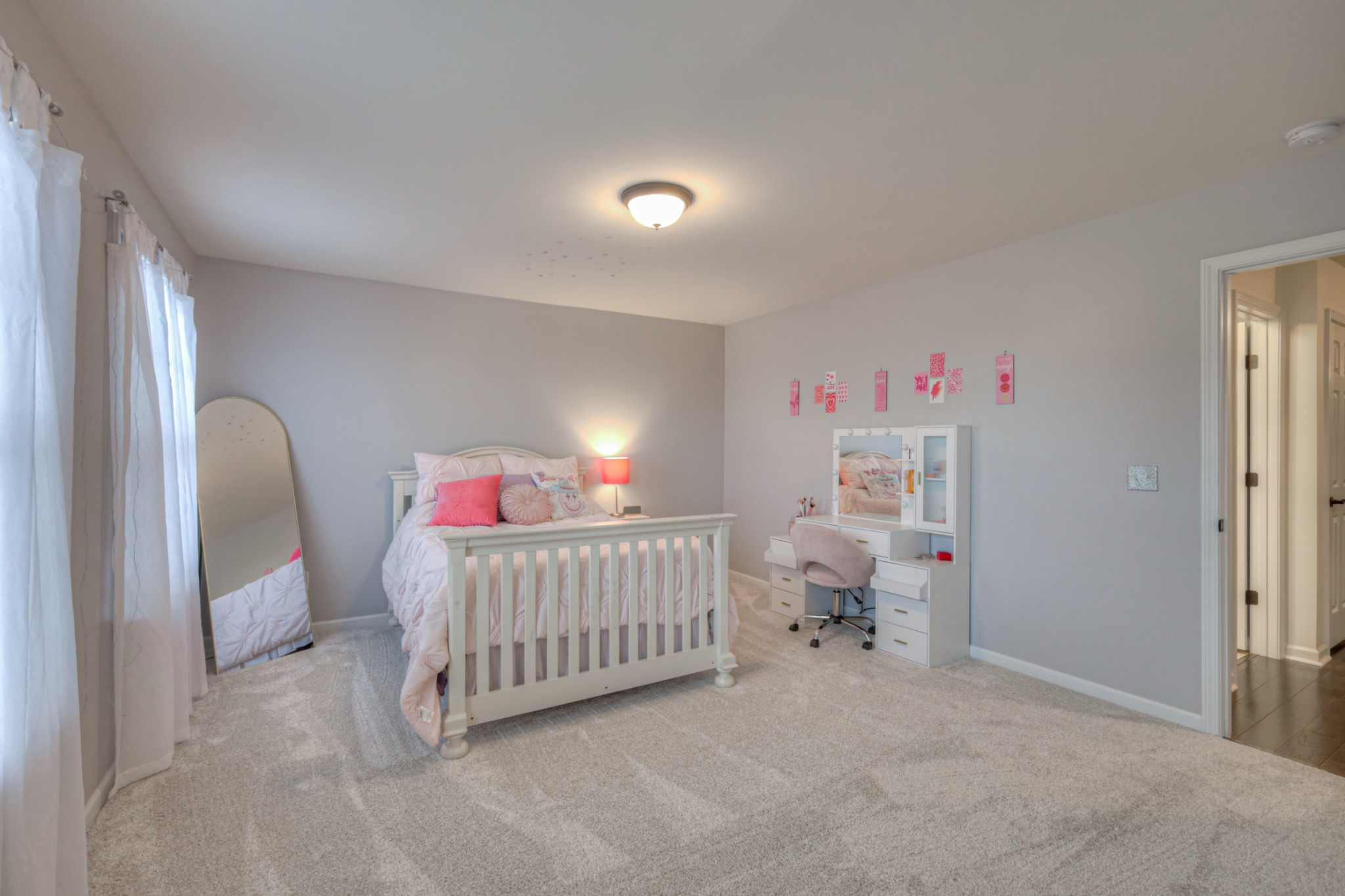 1446 Old Stone Road Lebanon, TN 37087 - Photo 27 of 33 a bedroom with a bed and white walls