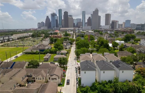 a view of a city with tall buildings