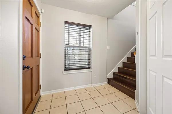 a view of an entryway with staircase