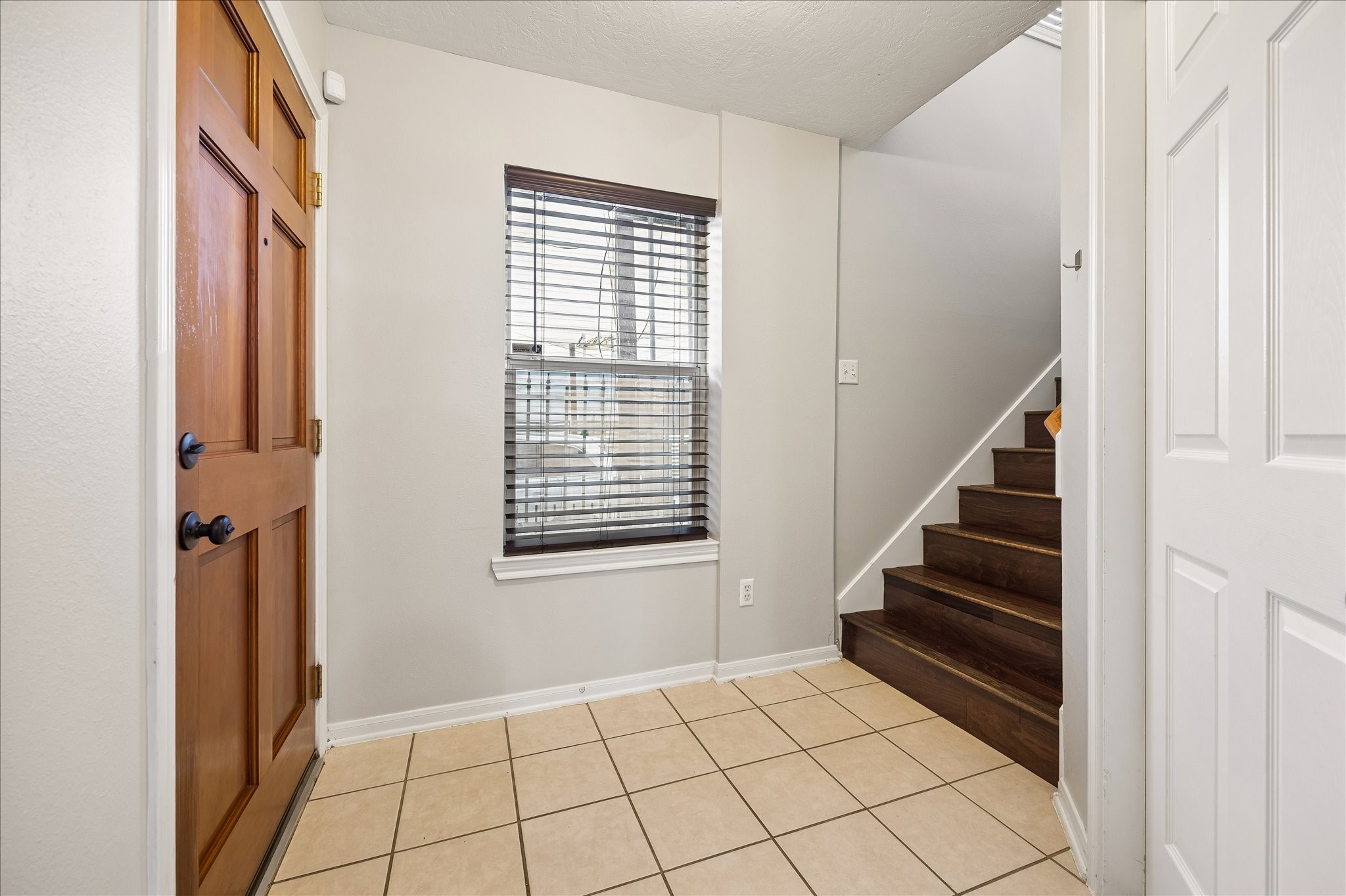 1510 Robin Street, Unit A Houston, TX 77019 - Photo 3 of 17 a view of an entryway with staircase