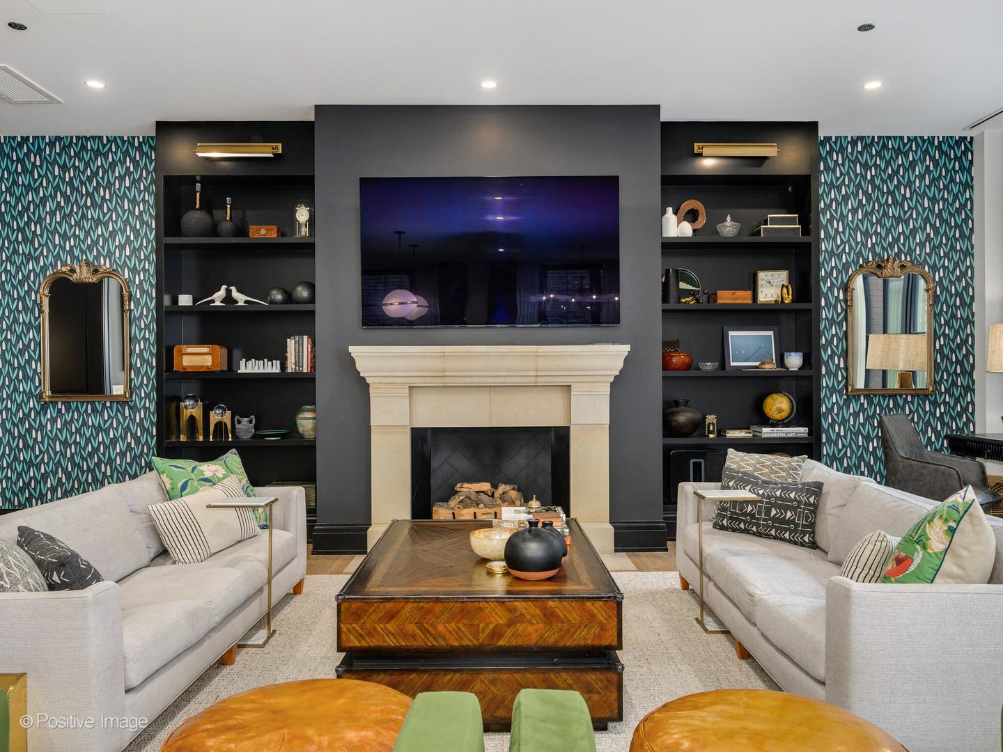 1109 West Washington Boulevard, Unit 2C Chicago, IL 60607 - Photo 12 of 40 a living room with furniture a flat screen tv and a fireplace