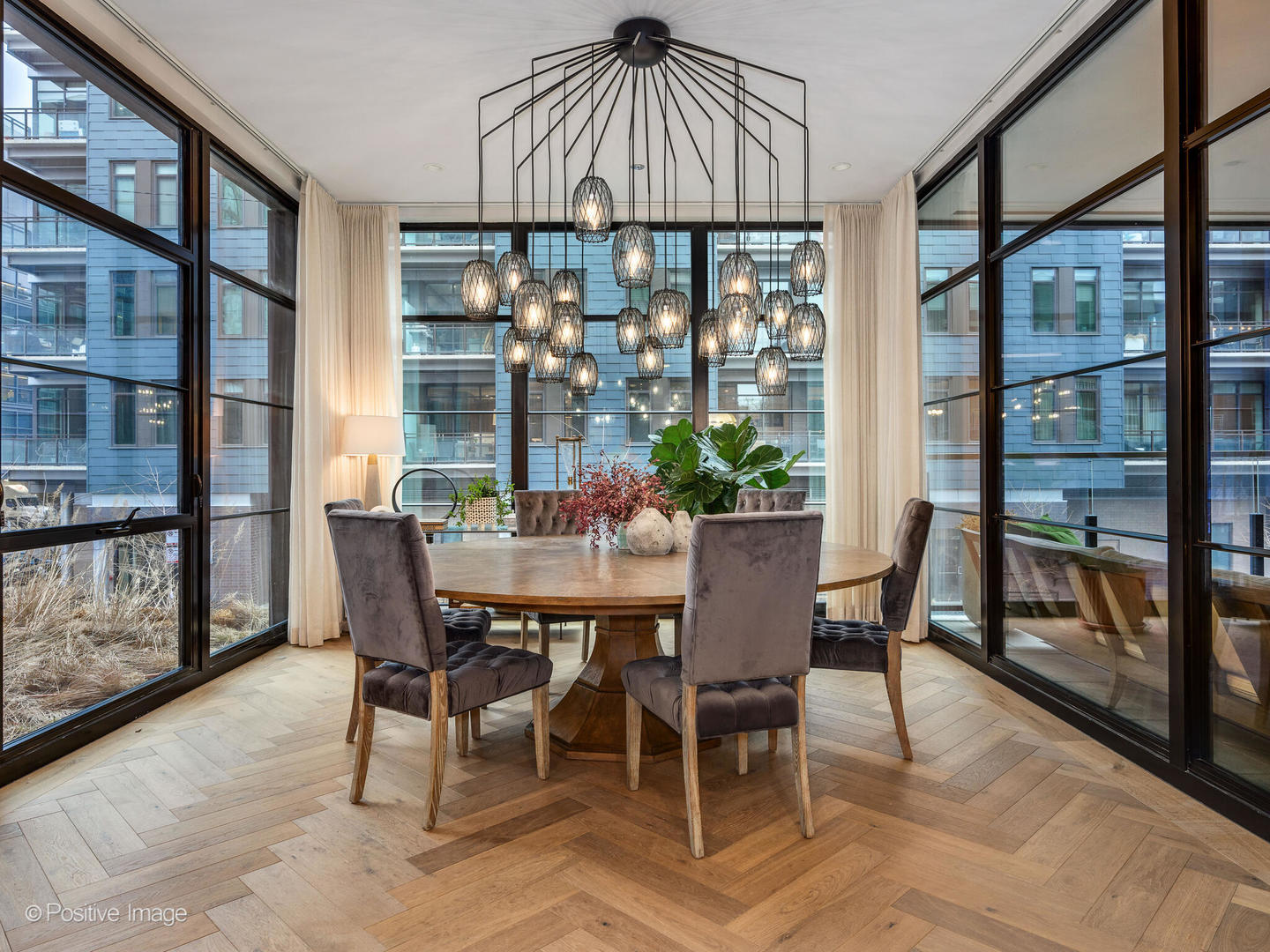 1109 West Washington Boulevard, Unit 2C Chicago, IL 60607 - Photo 23 of 40 a view of a dining room with furniture window and wooden floor