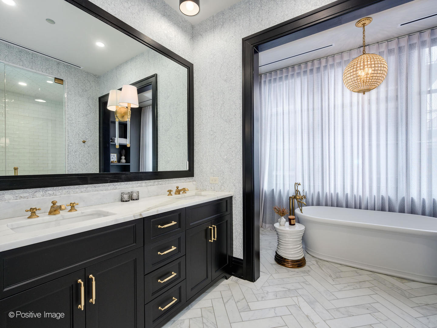1109 West Washington Boulevard, Unit 2C Chicago, IL 60607 - Photo 31 of 40 a bathroom with a double vanity sink mirror and bathtub
