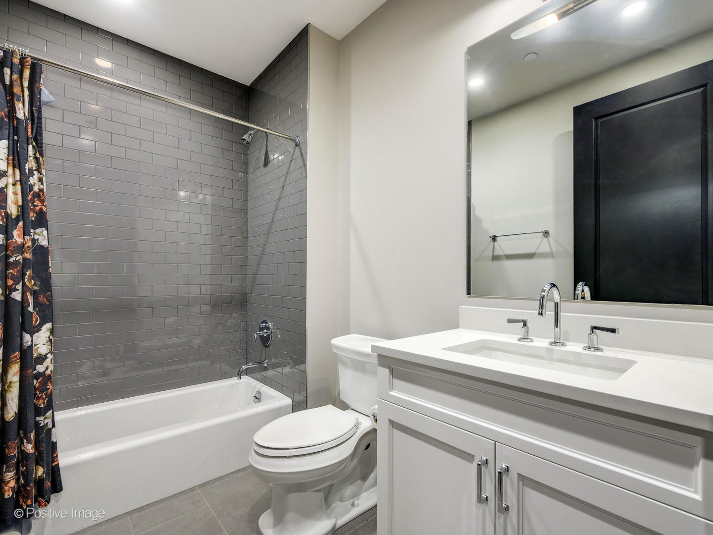 1109 West Washington Boulevard, Unit 2C Chicago, IL 60607 - Photo 39 of 40 a bathroom with a sink a toilet and shower
