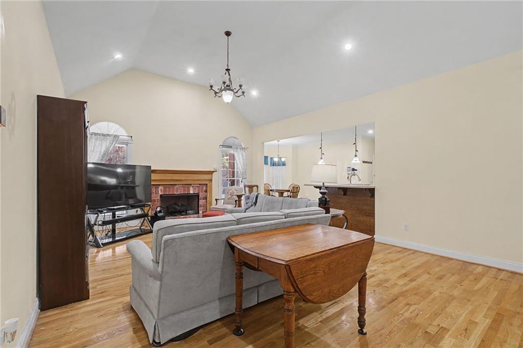15 County Road 396 Centre, AL 35960 - Photo 16 of 54 a dining hall with stainless steel appliances a dining table and chairs with wooden floor