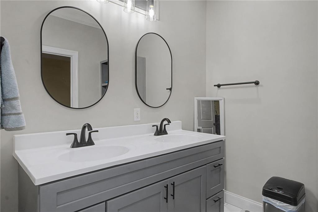 15 County Road 396 Centre, AL 35960 - Photo 33 of 54 a bathroom with a sink and a mirror