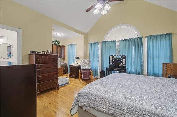 a bedroom with a bed and furniture