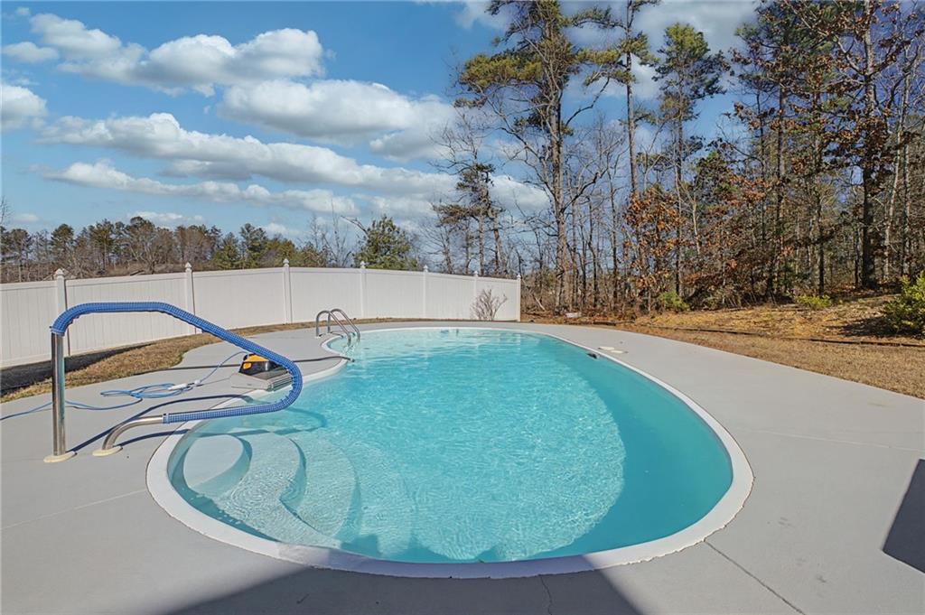 15 County Road 396 Centre, AL 35960 - Photo 49 of 54 a view of a swimming pool with a yard