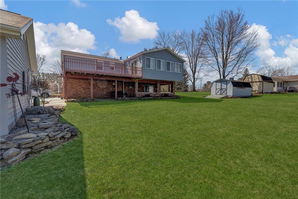 4930 Dutch Ridge Road Brighton Township, PA 15009 - Photo 24 of 25 a view of a big house with a big yard and large trees