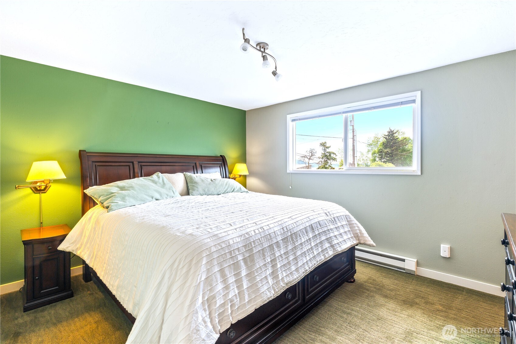 9609 Samish Island Road Bow, WA 98232 - Photo 12 of 33 a bedroom with a bed and window