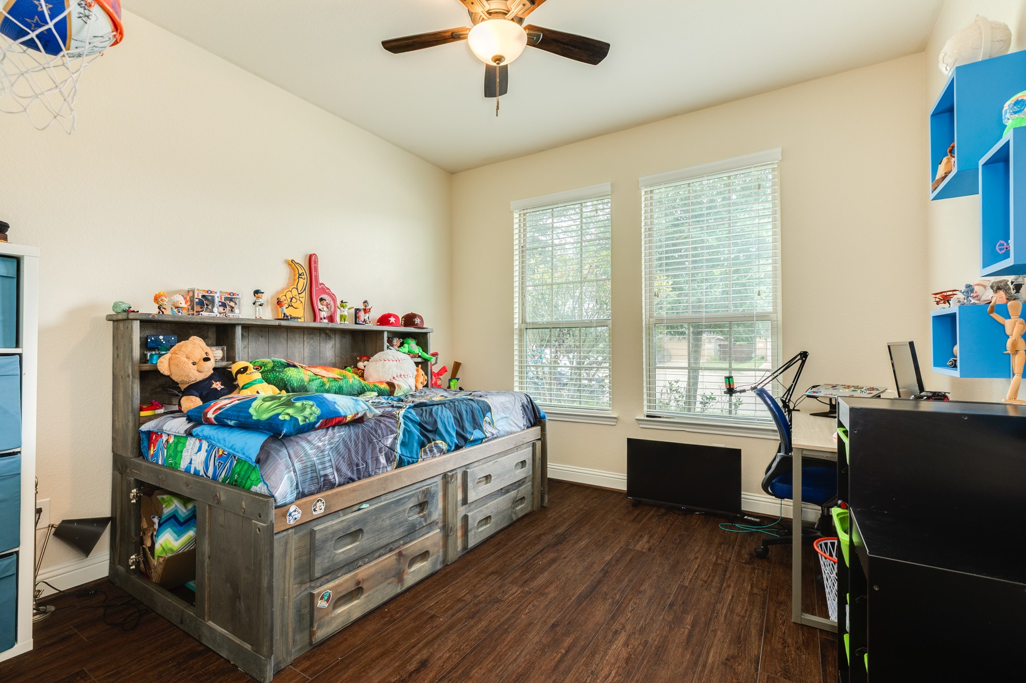 3519 Bay Drive Rosharon, TX 77583 - Photo 6 of 49 Secondary bedroom located on the street-facing side of the home, featuring two large windows that provide ample natural light.