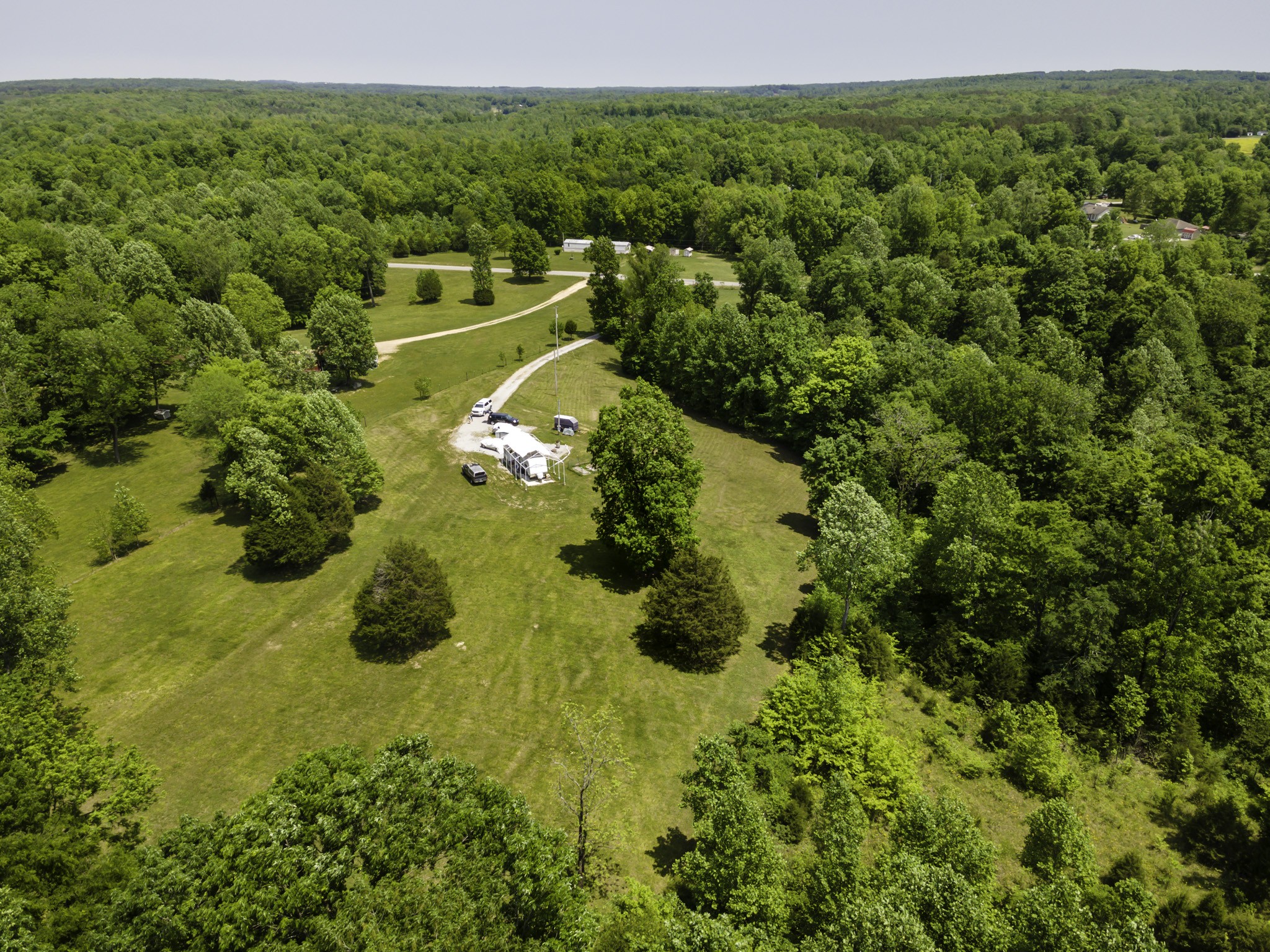 133 Clifton Road Lawrenceburg, TN 38464 - Photo 24 of 27 a view of a forest with a street