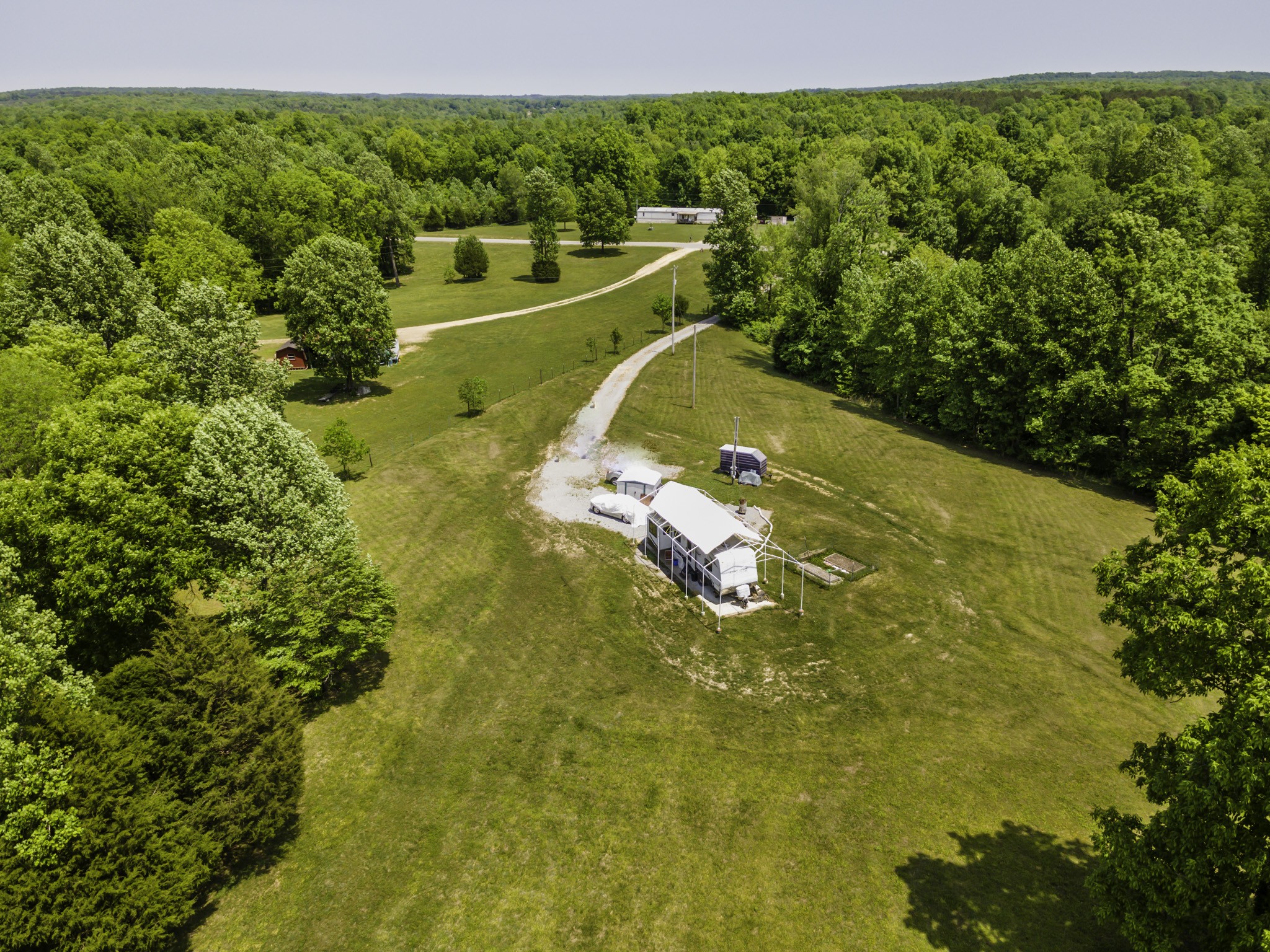 133 Clifton Road Lawrenceburg, TN 38464 - Photo 25 of 27 a view of a lake with a houses