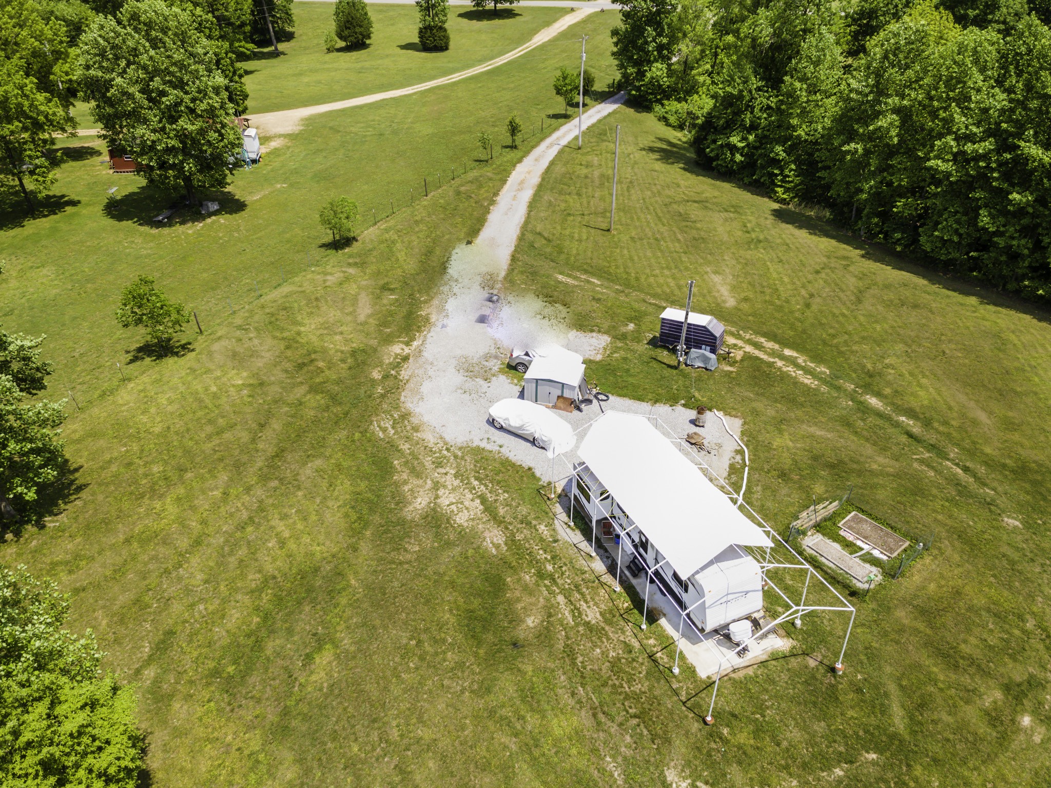 133 Clifton Road Lawrenceburg, TN 38464 - Photo 26 of 27 a aerial view of a house with a yard and swimming pool