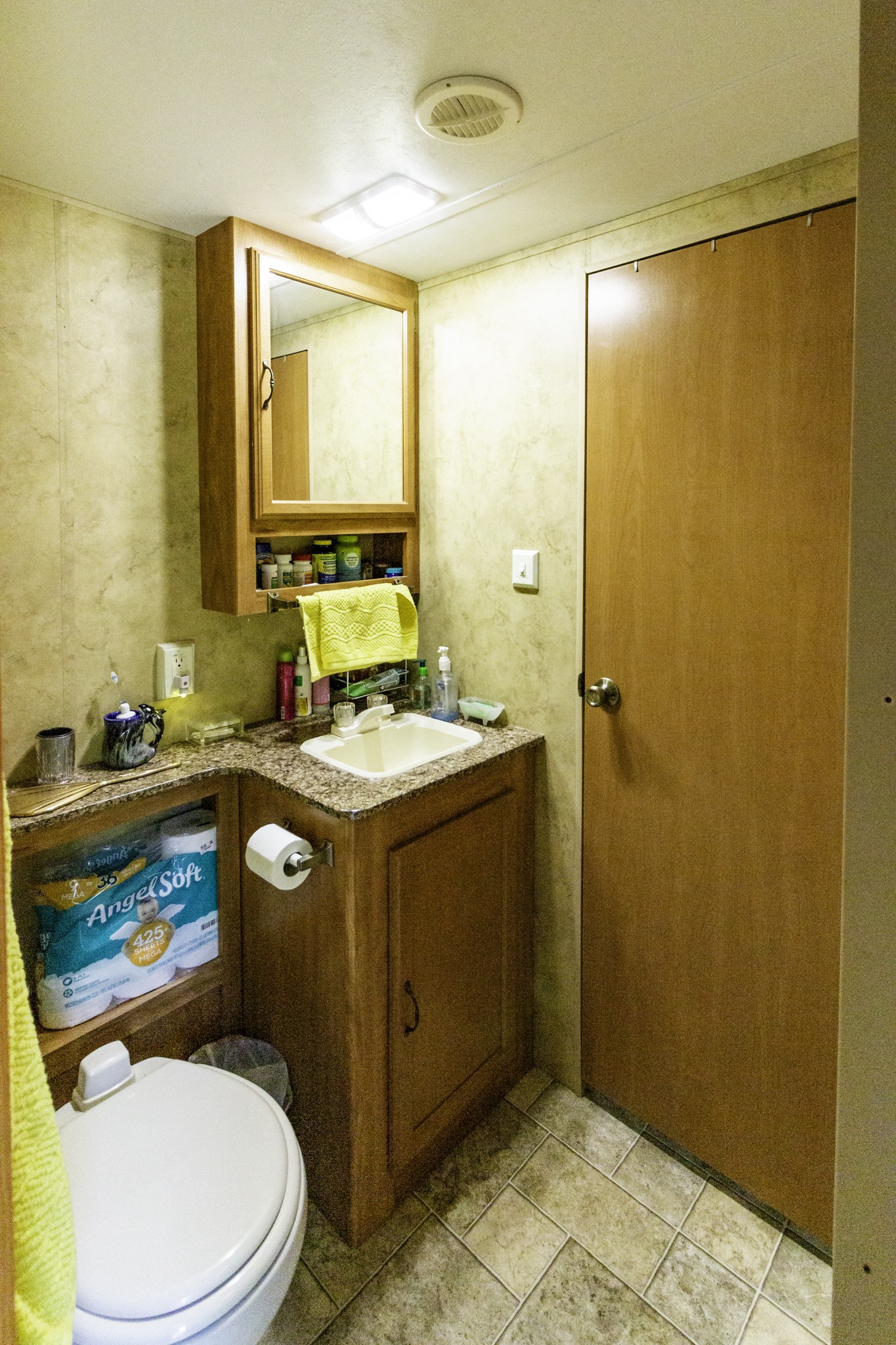133 Clifton Road Lawrenceburg, TN 38464 - Photo 4 of 27 a bathroom with a granite countertop sink toilet and shower