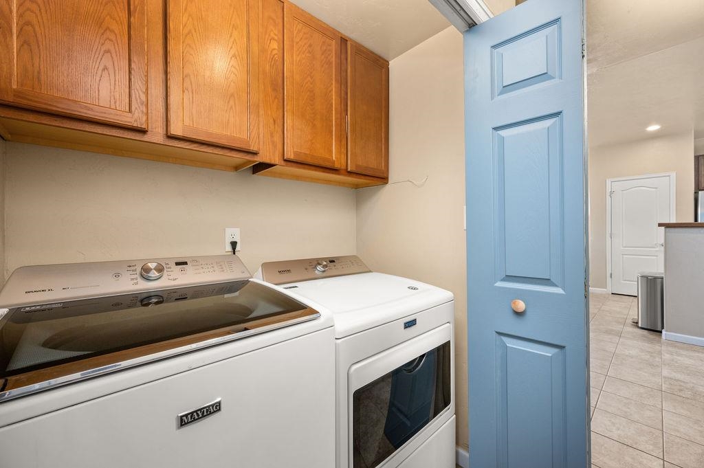 2436 1/2 Jack Creek Road Grand Junction, CO 81505 - Photo 25 of 36 a utility room with dryer and washer