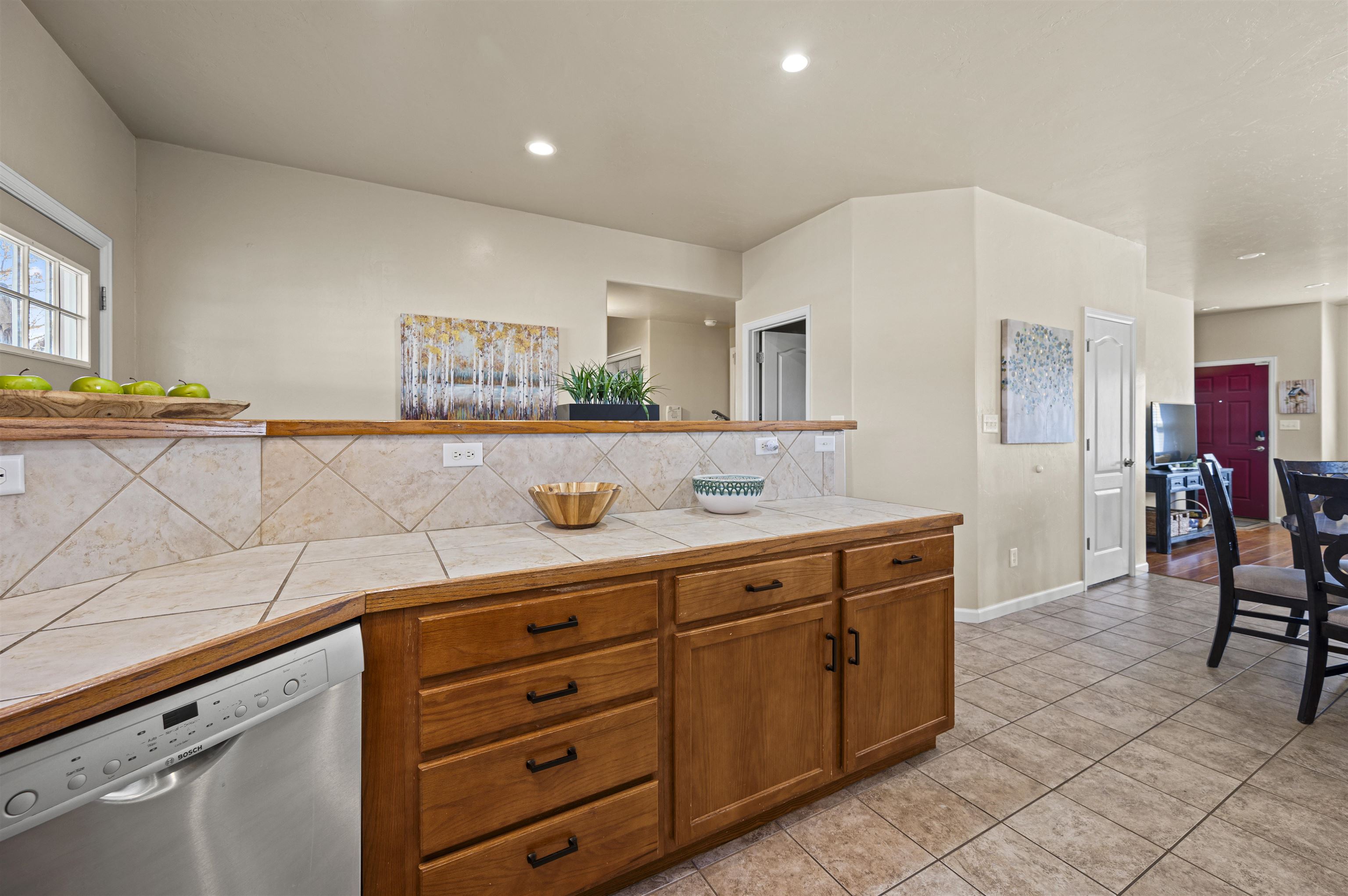 2436 1/2 Jack Creek Road Grand Junction, CO 81505 - Photo 9 of 36 a spacious bathroom with a sink a mirror and a bathtub