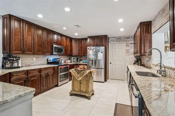 $889,900 | 6054 Marlberry Drive, Orlando, FL 32819