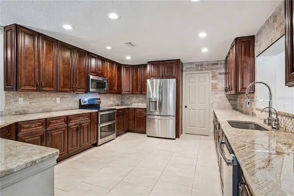 $889,900 | 6054 Marlberry Drive, Orlando, FL 32819