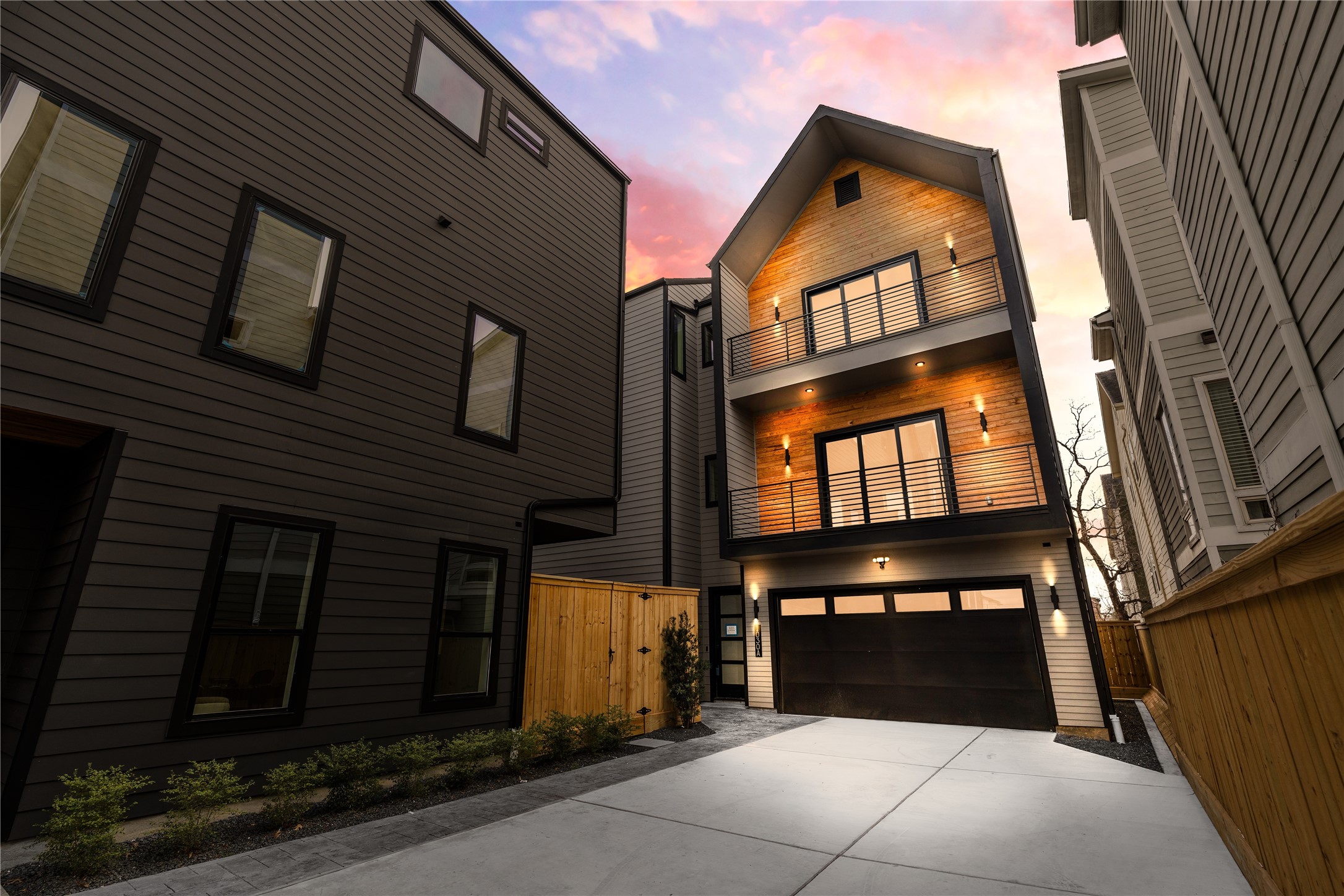 Welcome to 1030 W 24th StreetUnit A — this unit is an urban sanctuary nestled in the heart of Shady Acres. Set within a thoughtfully curated enclave, this striking residence combines bold architectural lines with the warmth of natural materials, creating a distinct sense of place. Just moments from the vibrant energy of the Heights, yet tucked away on a private drive, the community offers a rare balance of walkable city living and refined retreat