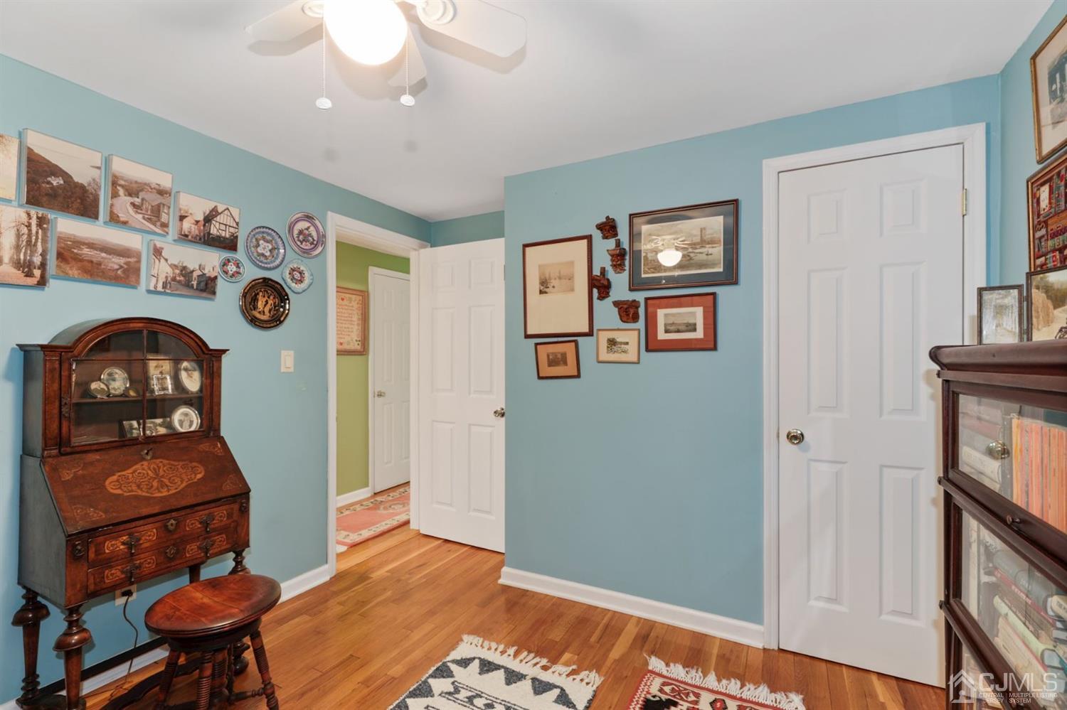49 Albemarle Road Colonia, NJ 07067 - Photo 14 of 20 a view of a livingroom with furniture and workspace