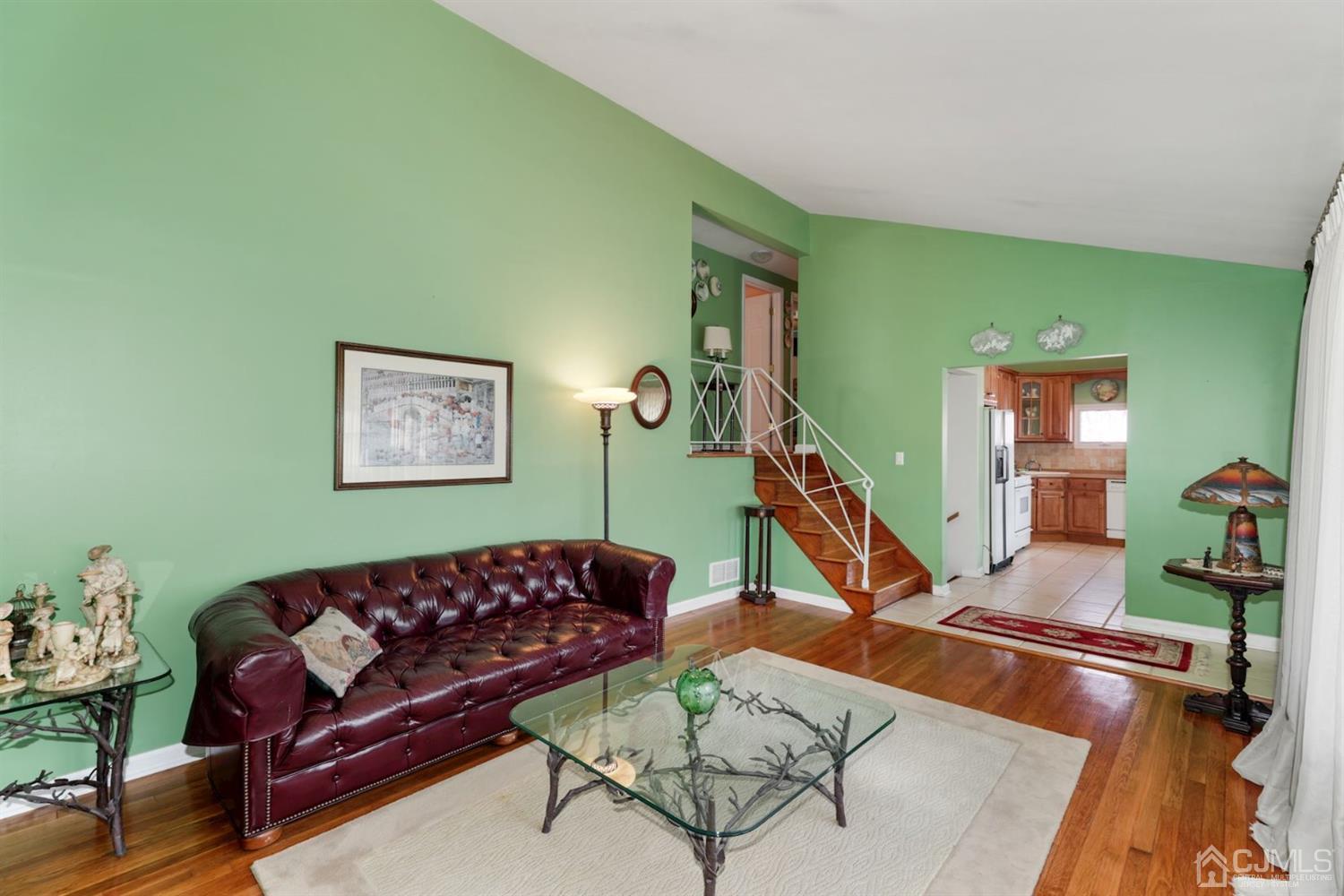 49 Albemarle Road Colonia, NJ 07067 - Photo 5 of 20 a living room with furniture and wooden floor