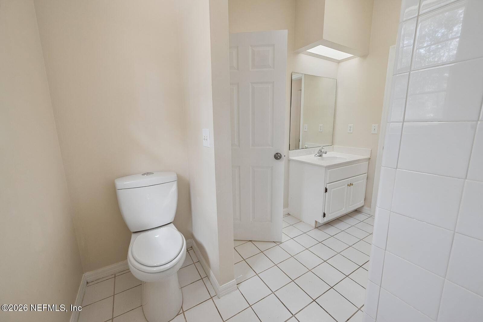 6240 Payne Road Keystone Heights, FL 32656 - Photo 13 of 43 a white toilet sitting next to a bathroom sink