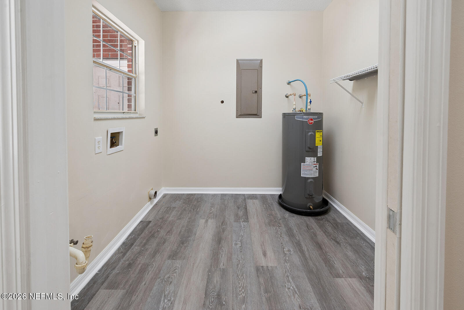 6240 Payne Road Keystone Heights, FL 32656 - Photo 22 of 43 a room with hard wood floors and a window