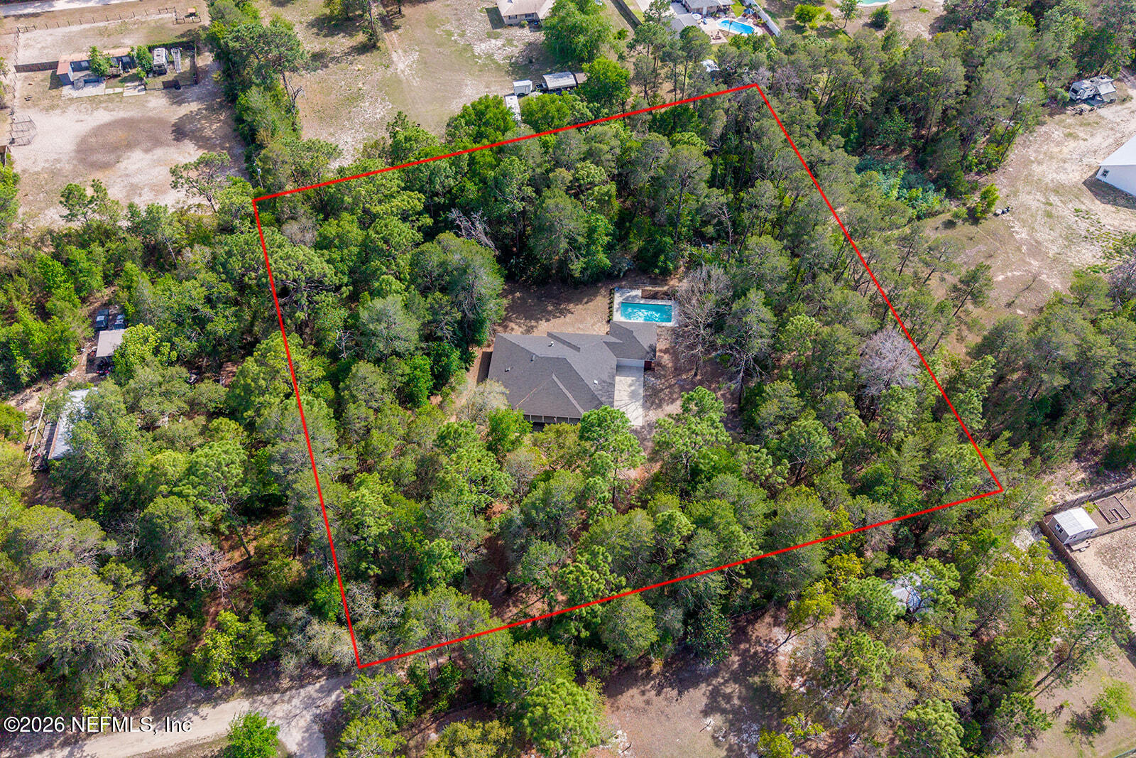 6240 Payne Road Keystone Heights, FL 32656 - Photo 42 of 43 an aerial view of a house with a yard and garden