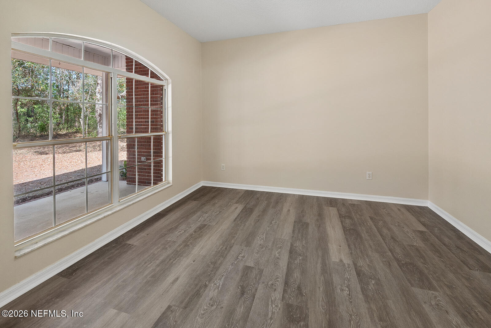 6240 Payne Road Keystone Heights, FL 32656 - Photo 5 of 43 a view of wooden floor and windows in a room