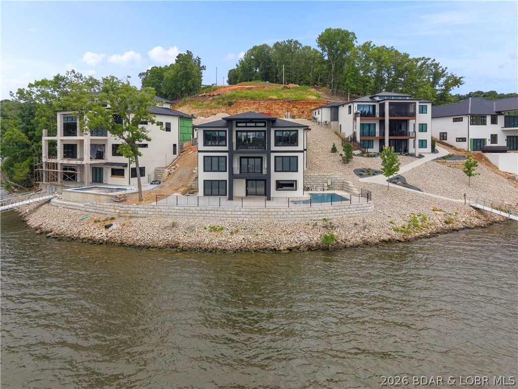 439 Red Bud Road Lake Ozark, MO 65049 - Photo 79 of 98 Stunning waterfront elevation showcasing luxurious