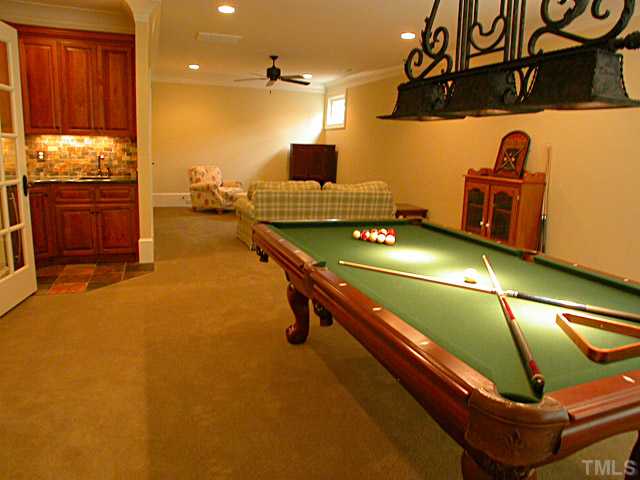 3032 Cone Manor Lane Raleigh, NC 27613 - Photo 10 of 12 a room with gym equipment