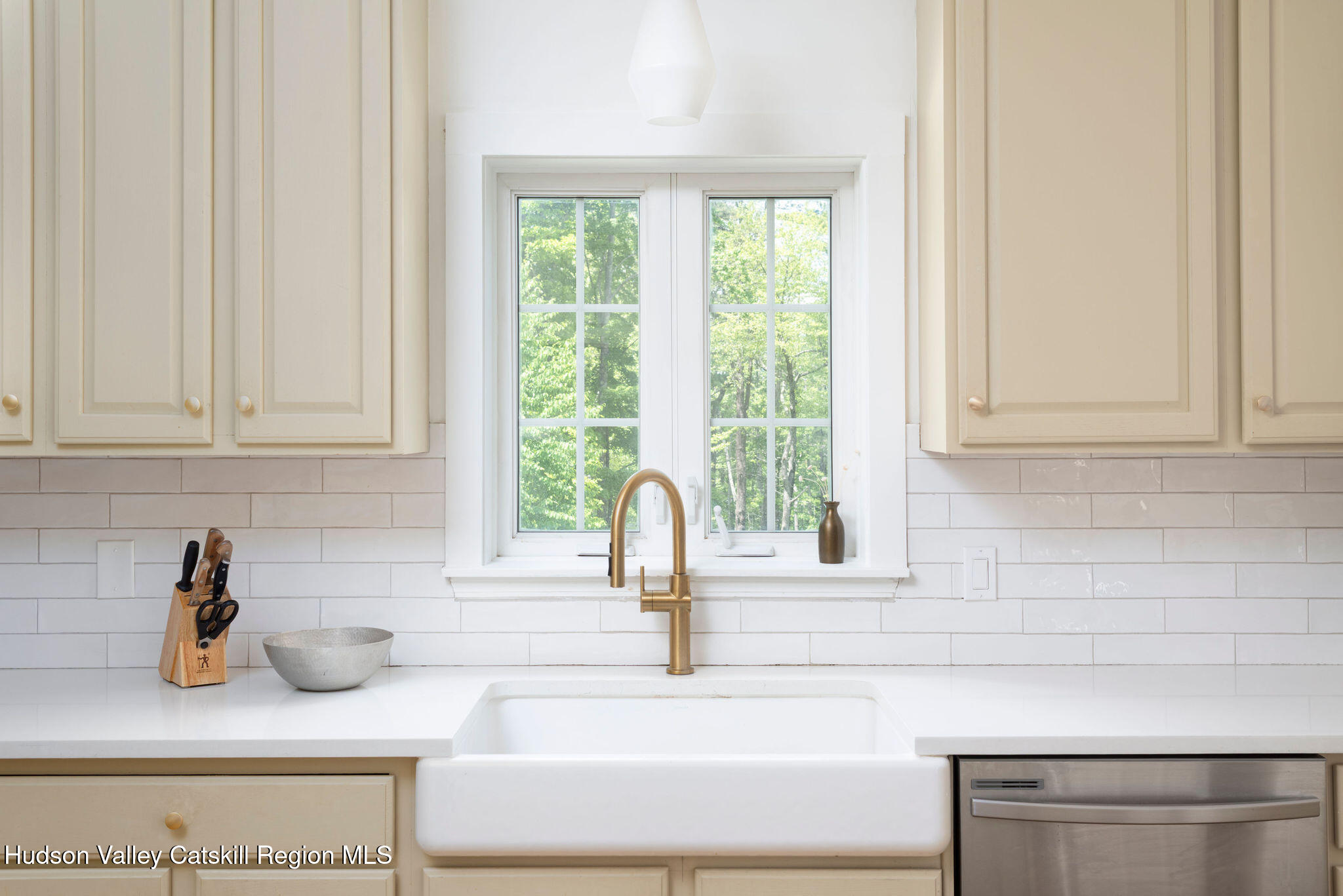 31 Laurel Hollow Road Kerhonkson, NY 12446 - Photo 10 of 47 a kitchen with a sink and cabinets