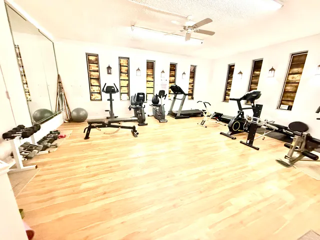 a view of a room with gym equipment