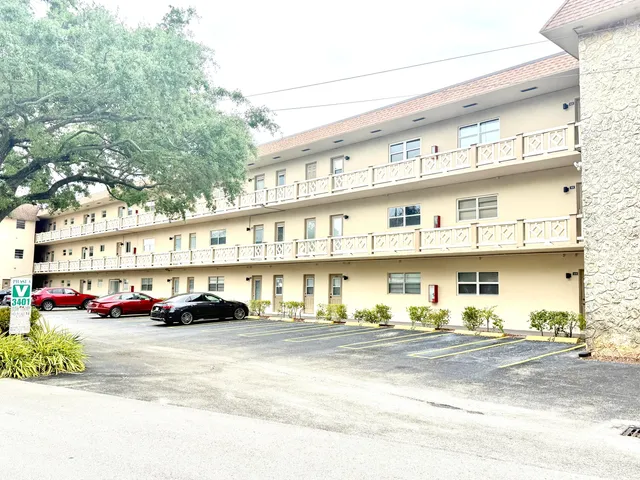 a view of street with parked cars