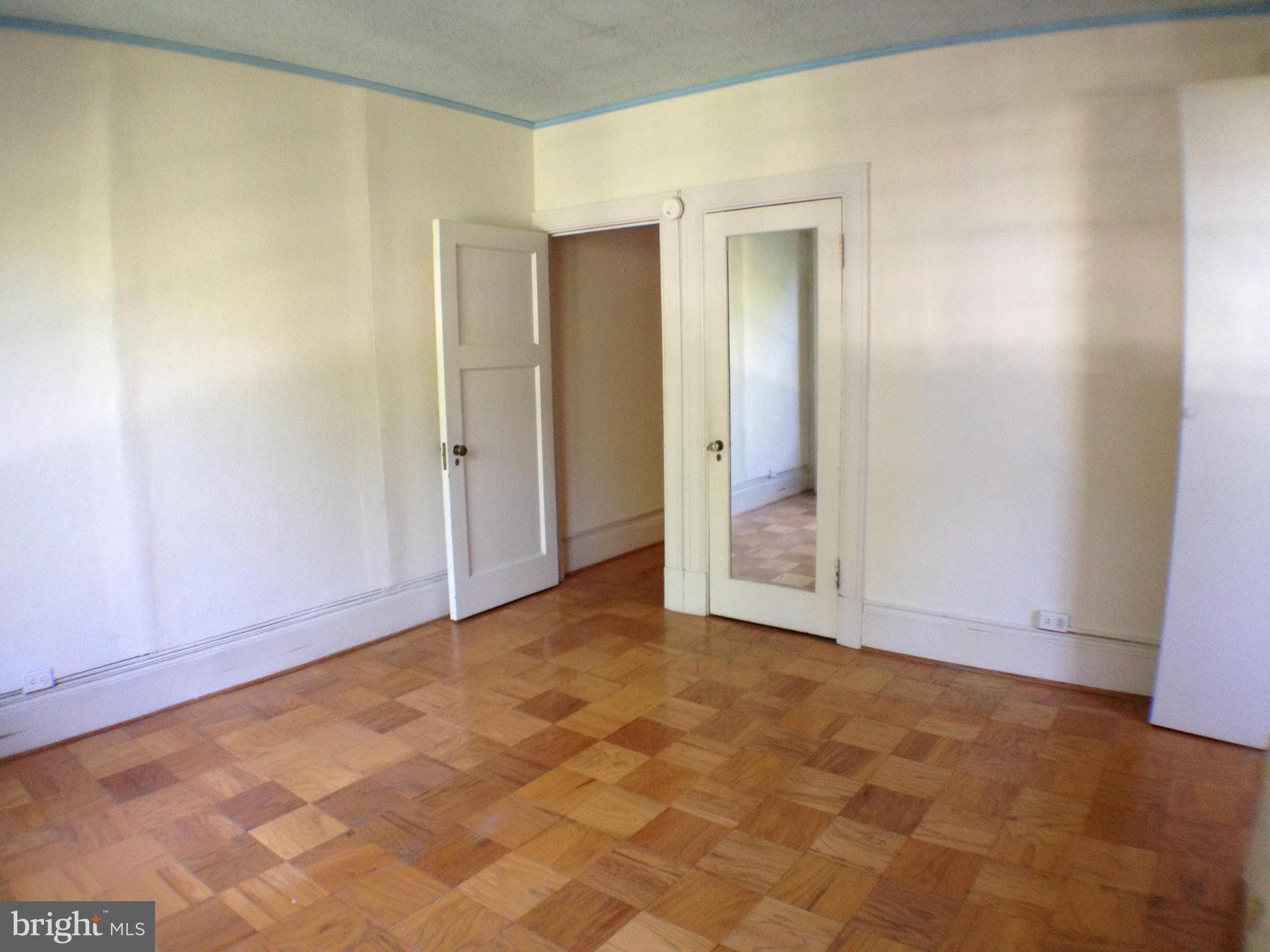 501 West University Parkway, Unit C1 Baltimore, MD 21210 - Photo 8 of 29 a view of an empty room