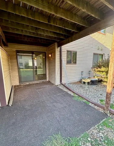 a view of a backyard of the house