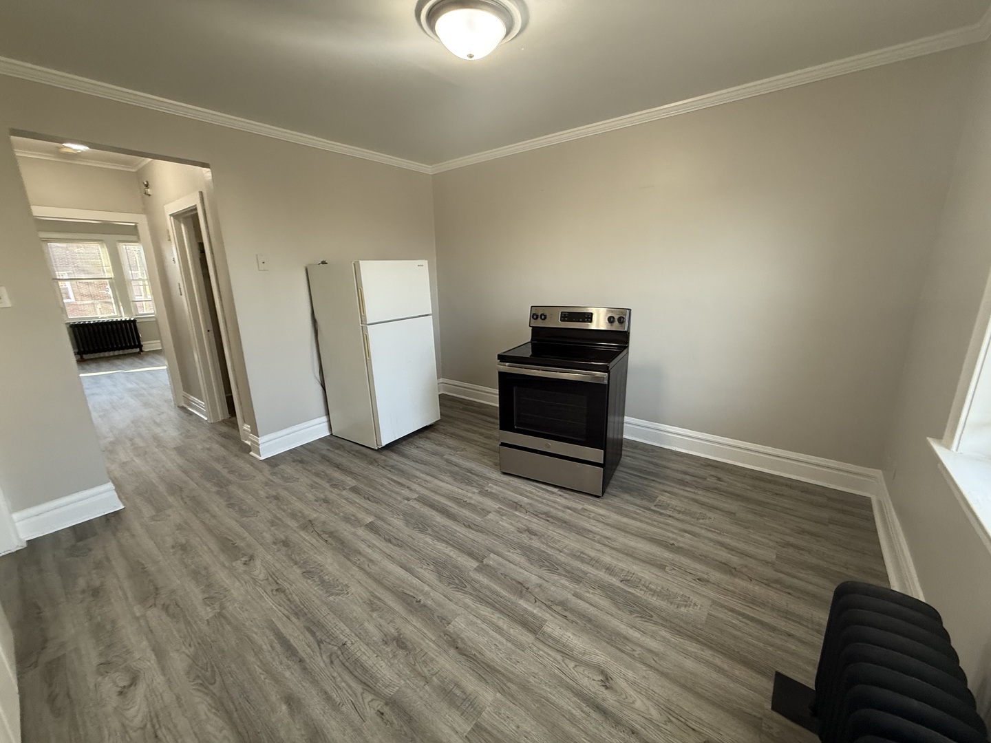6443 23rd Street, Unit 12 Berwyn, IL 60402 - Photo 7 of 9 a view of empty room with wooden floor