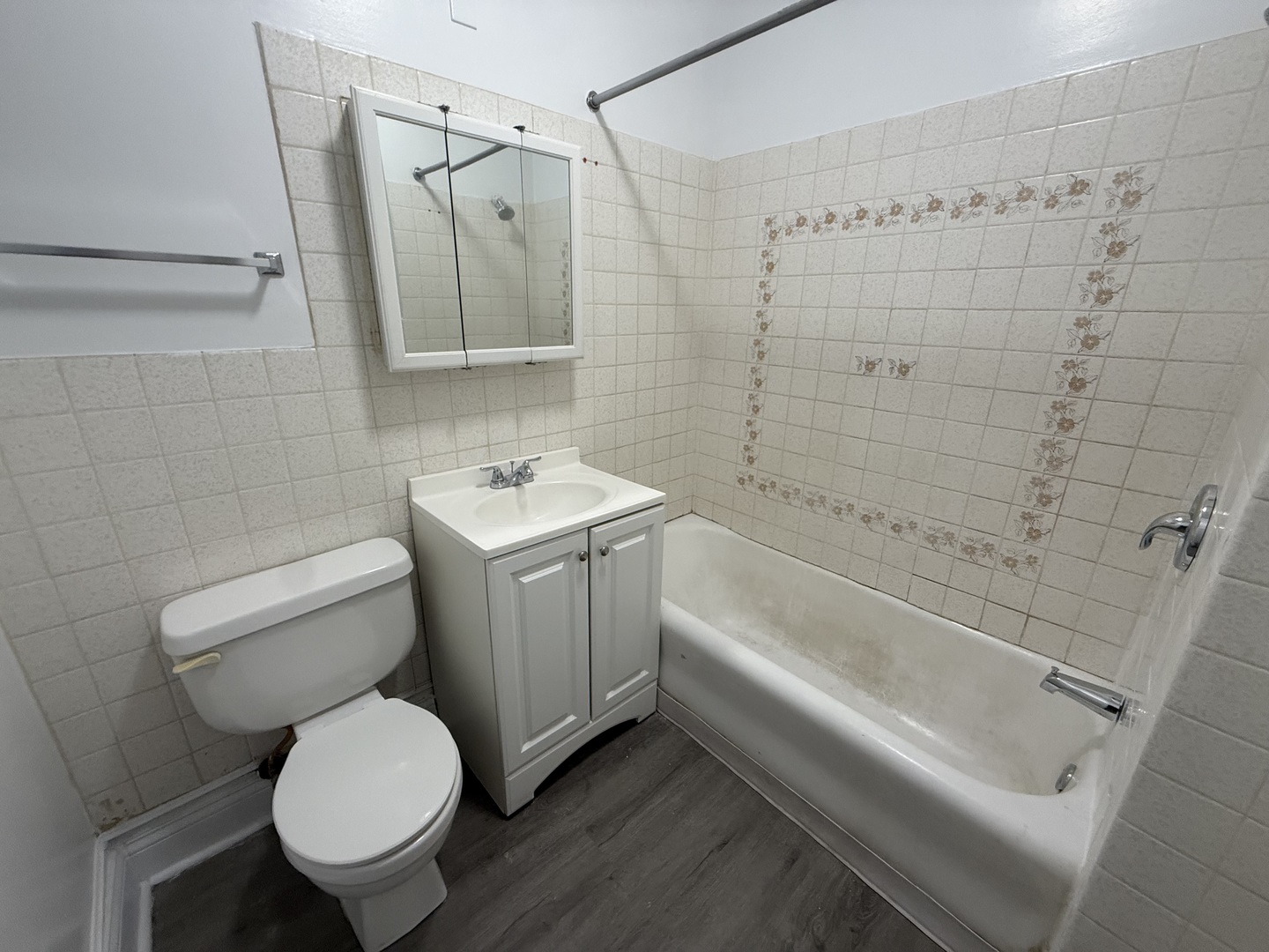 6443 23rd Street, Unit 12 Berwyn, IL 60402 - Photo 9 of 9 a bathroom with a toilet sink and shower