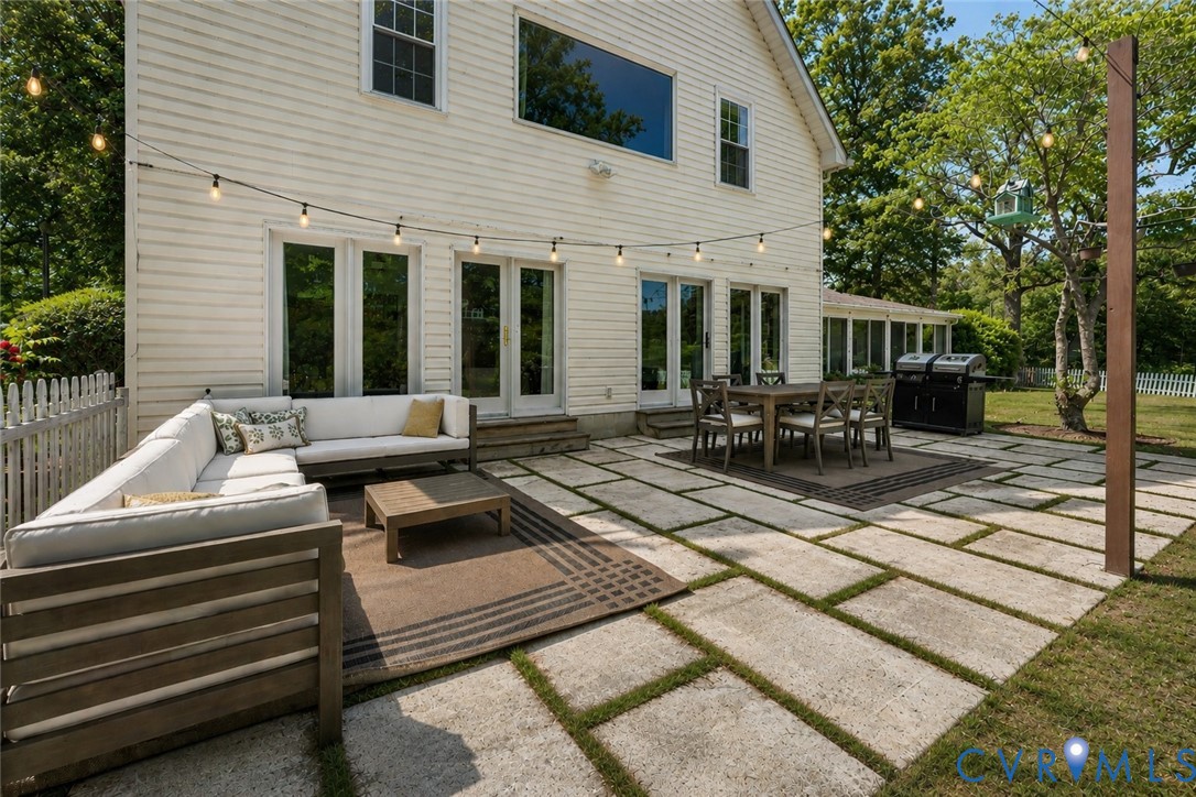 437 Plainview Road Kinsale, VA 22488 - Photo 57 of 63 a view of a patio with chairs and tables