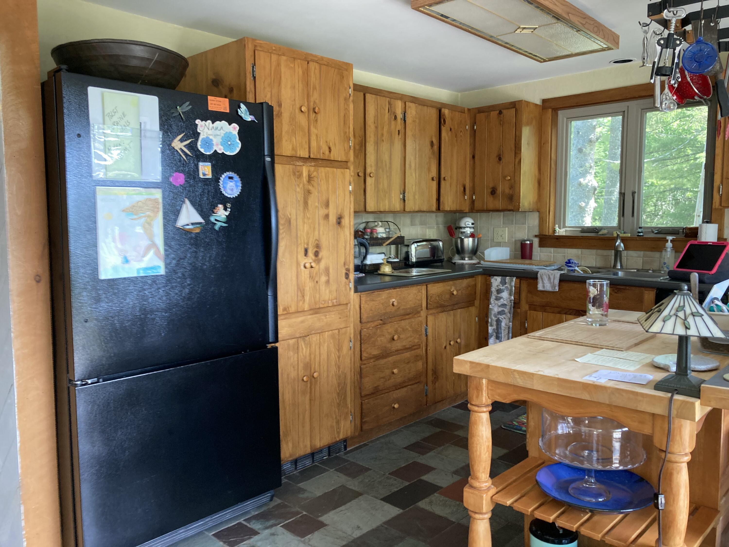 969 Surry Road Surry, ME 04684 - Photo 13 of 41 Slate kitchen floor.