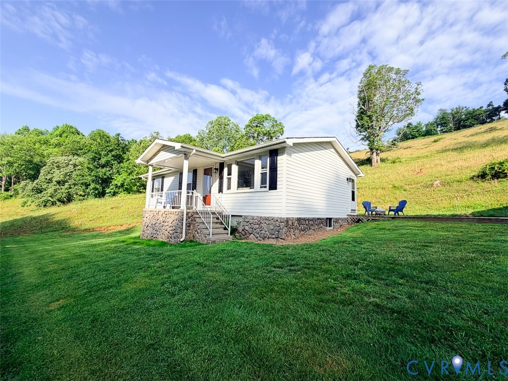 453 Long Hollow Road Cleveland, VA 24225 - Photo 10 of 50 a view of a house with a yard