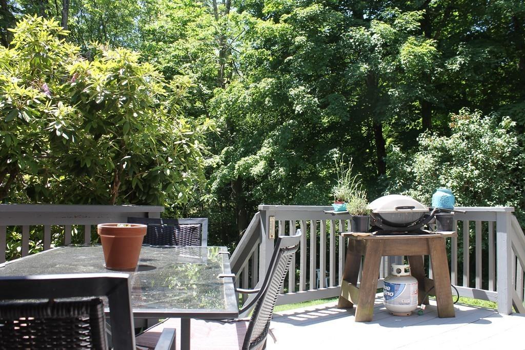 1887 North Brookfield Road Oakham, MA 01068 - Photo 4 of 23 a view of a chairs and table in the patio